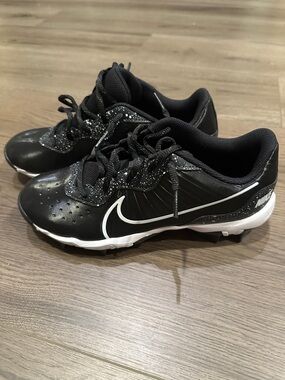 Nike Kids size 6y Black White Athletic Cleats.  Like new